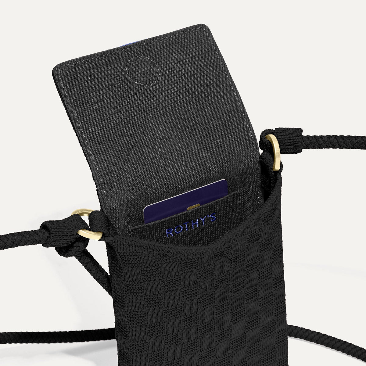 Close up of The Phone Crossbody interior slip pocket.