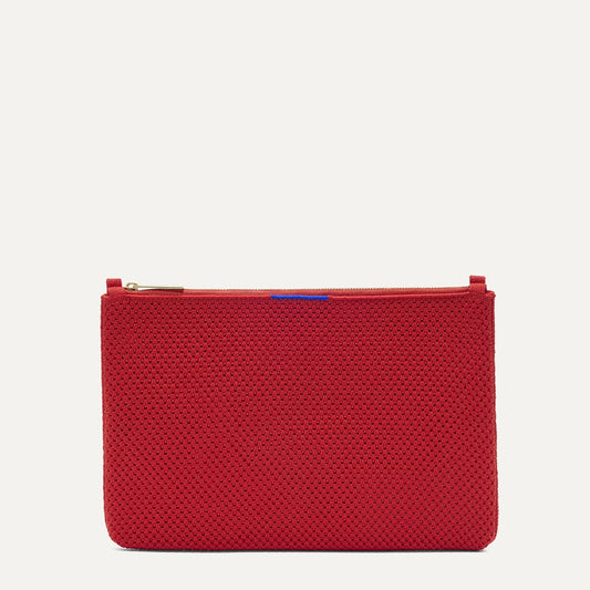 PDP |The Convertible Clutch in Scarlet Open-Knit, shown from the front.