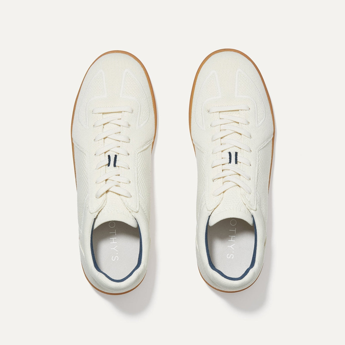 A pair of The RS01 Sneaker in Bone shown from the top.