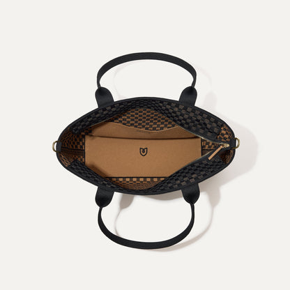 The Lightweight Zip Tote, shown from above with the interior exposed.