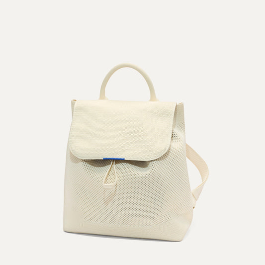 PLP | The Cinch Backpack in Coconut Crochet shown from the front.